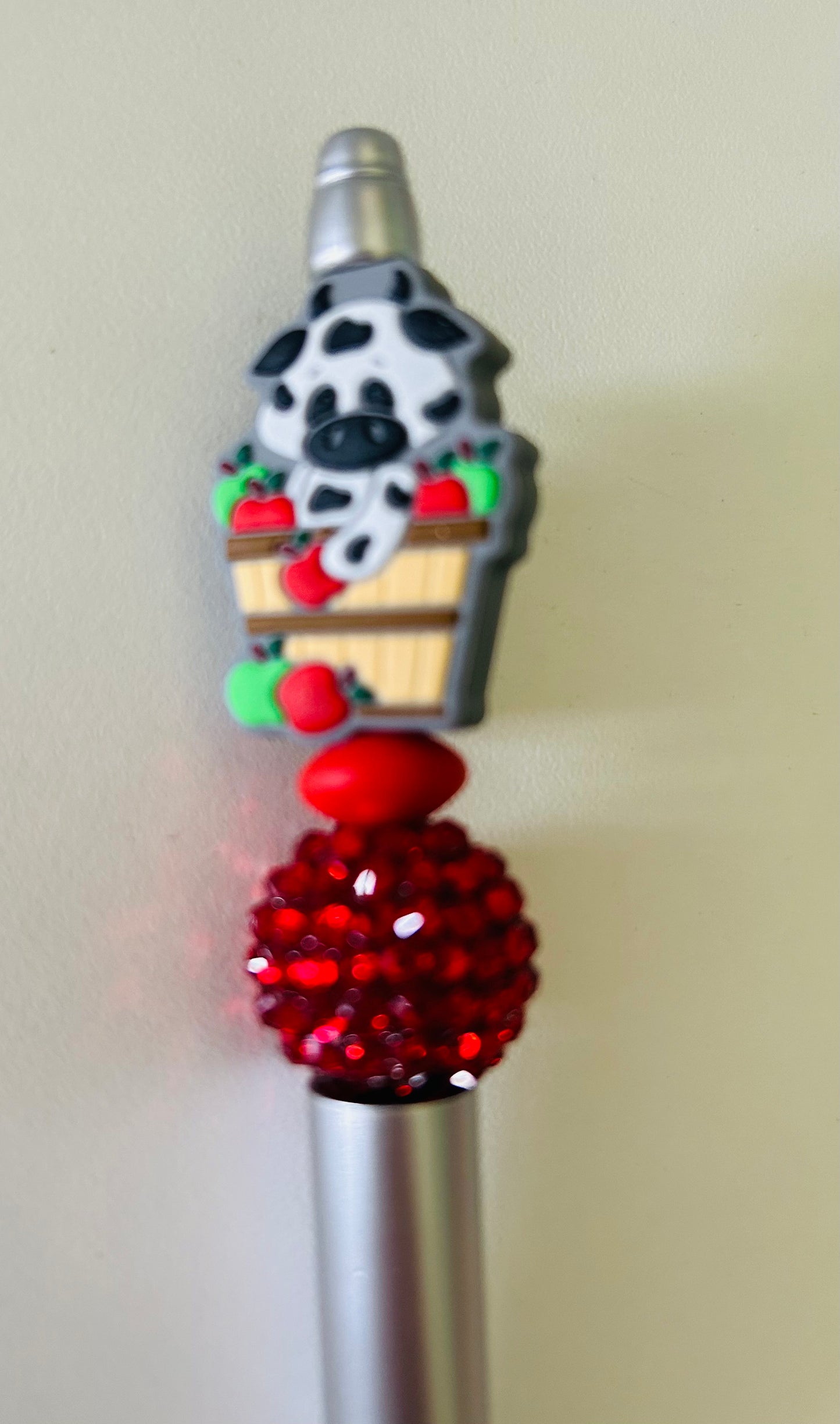 Pen-Focal Cow in Apple Basket