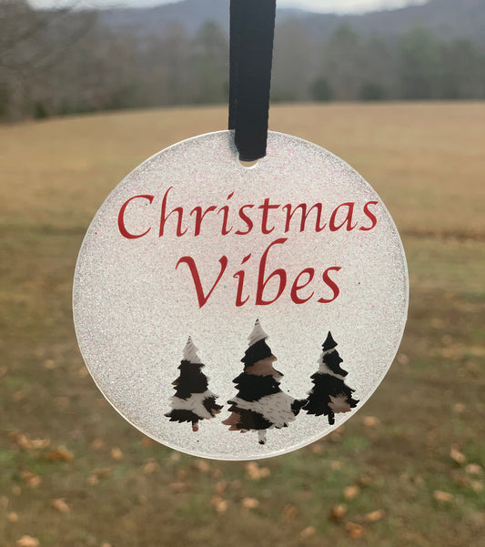Acrylic Ornaments with vinyl of trees and saying of Christmas Vibes.  Glitter and UV resin added.